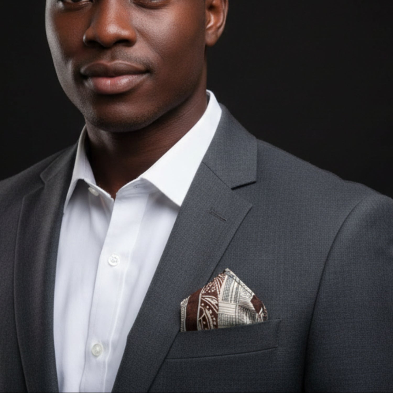 Main View: Light Brown, Brown Paisley and Geometric Pocket Square on man
