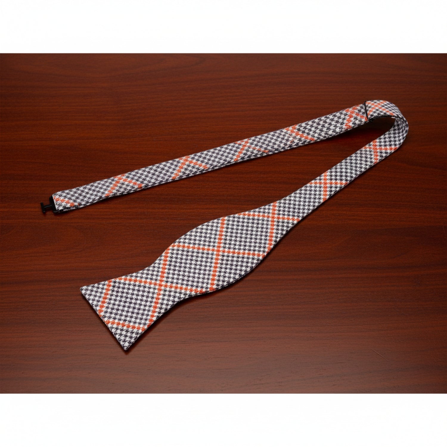 A Brown, Orange Geometric Check Pattern Self Tie Bow Tie Untied