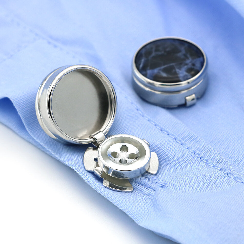 View 3: A Chrome colored button cover with blue black marble design