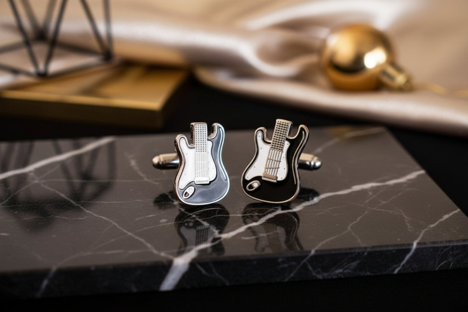 A Pair of Black, White Guitar Base Cuff-links