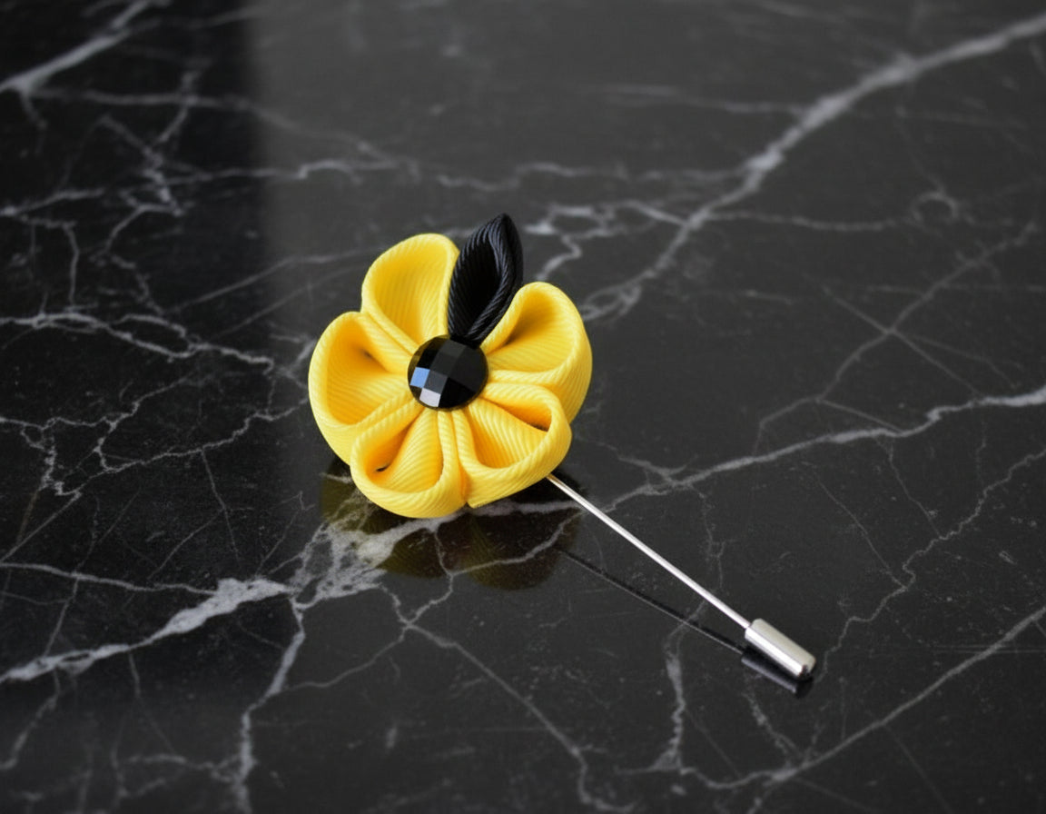 A Yellow, Black Colored Thick Petal Lapel Flower||Yellow, Black