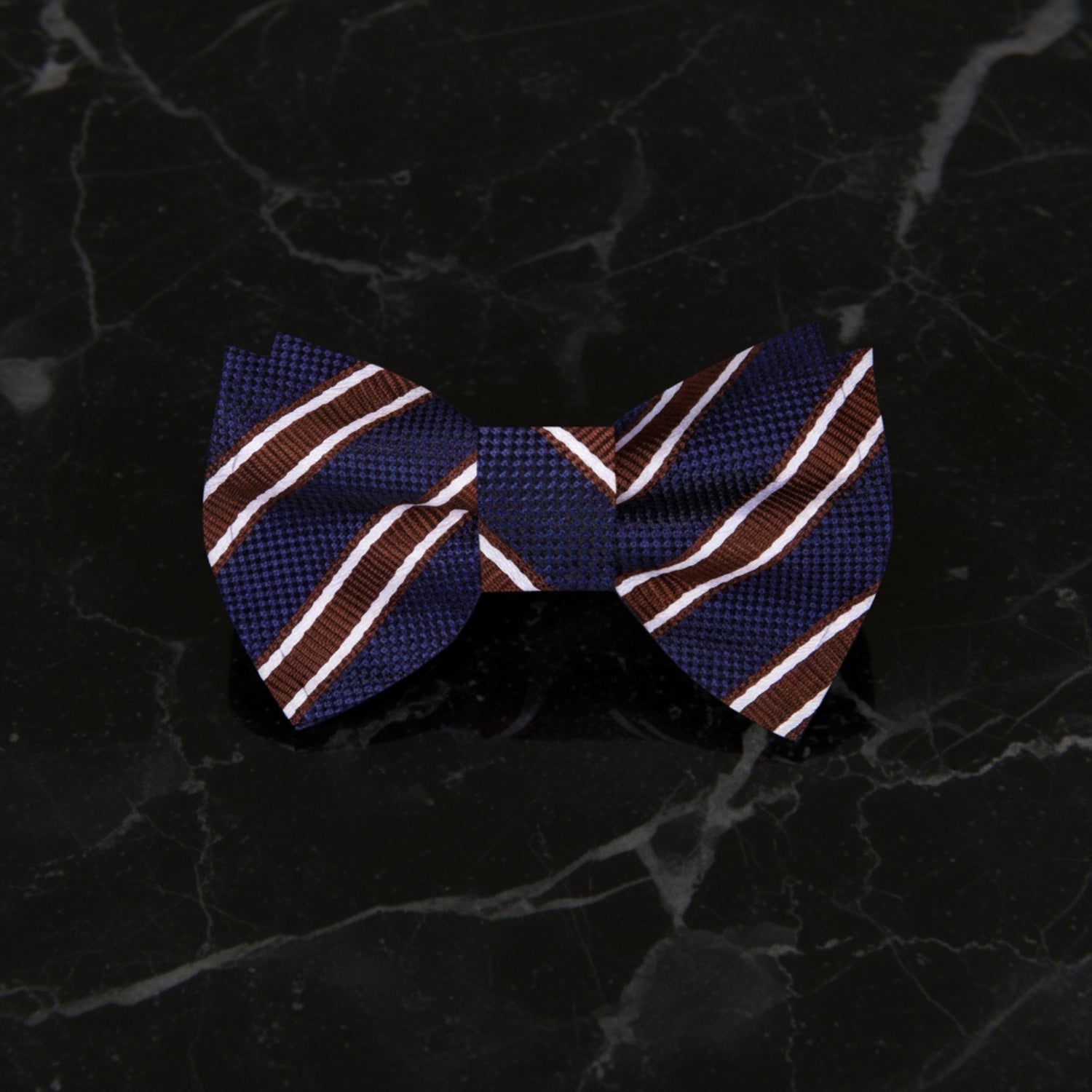 A Dark Blue, Brown, White Stripe Pattern Self Tie Bow Tie 