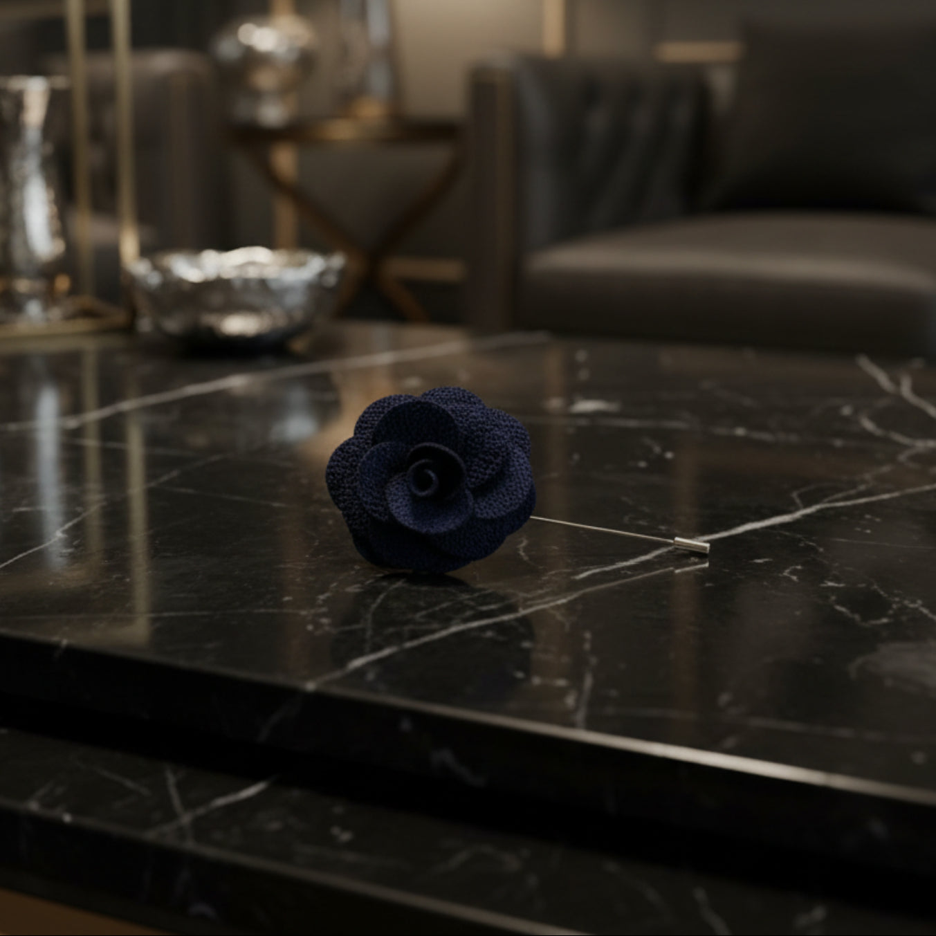 A Dark Blue Colored Lapel Flower