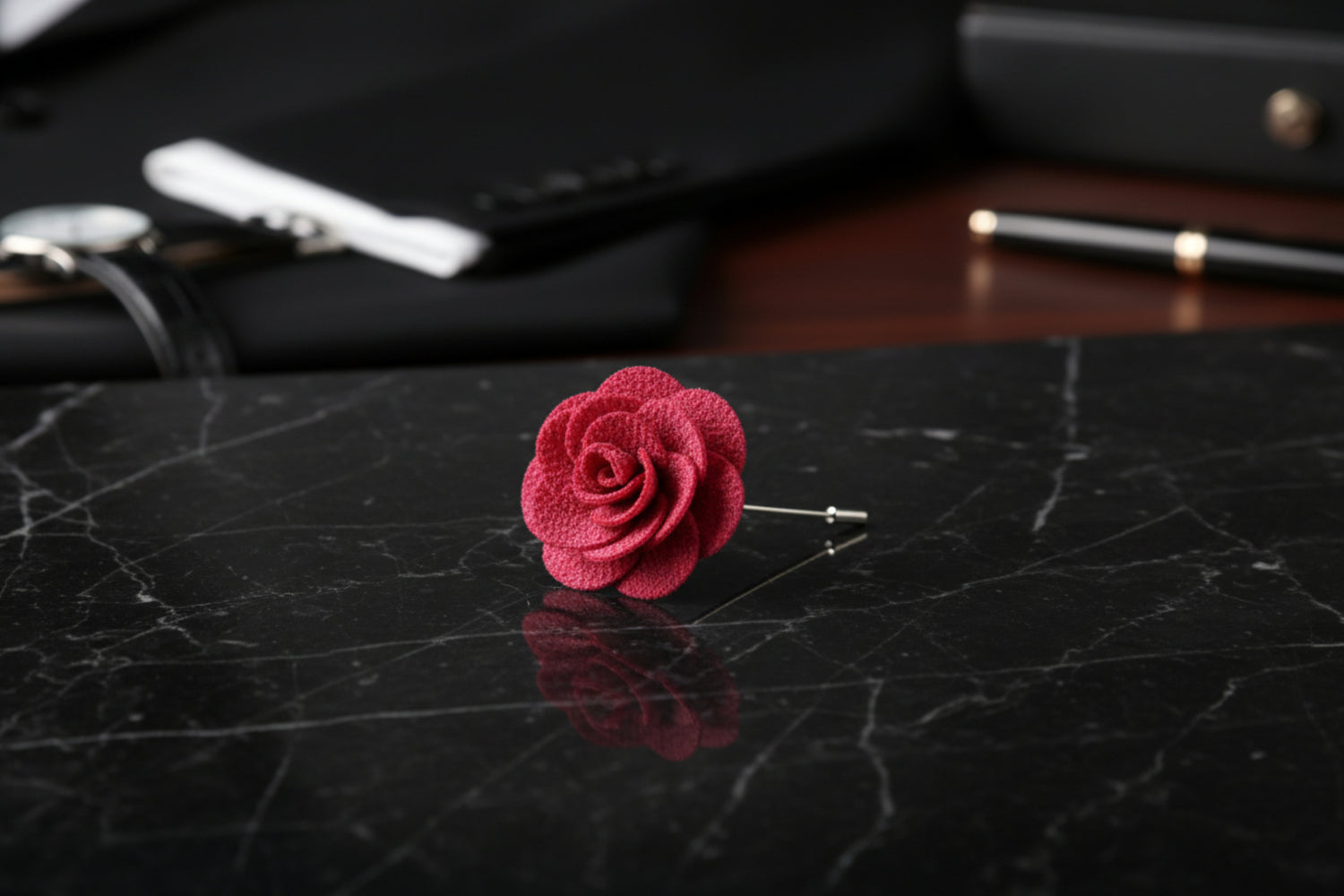 A Deep Pink Colored Lapel Flower