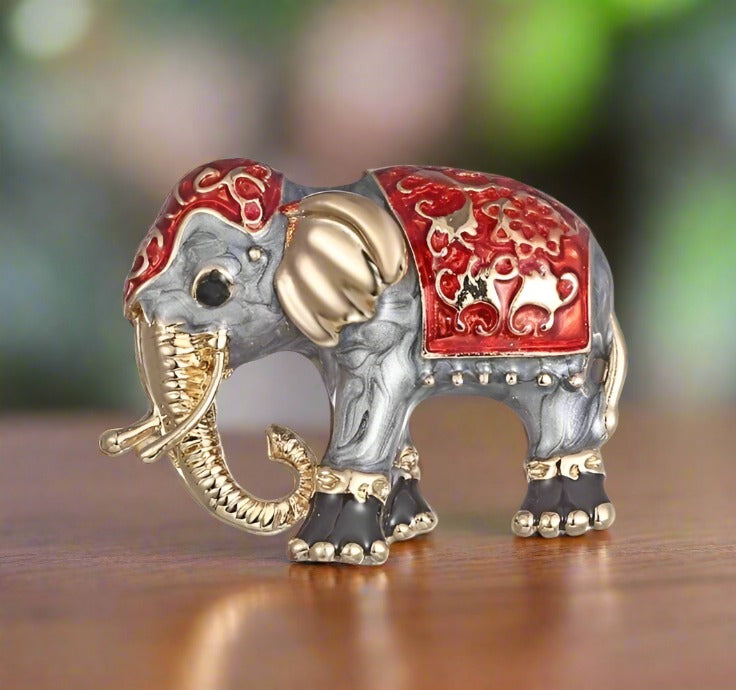 A Red, Gold Elephant Turtle Lapel Pin