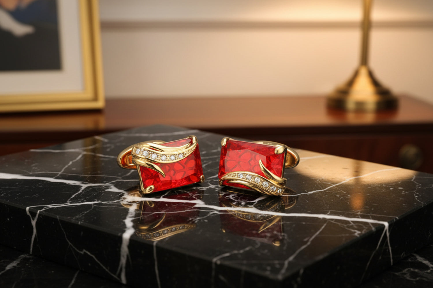A Gold Colored with Clear and Red Gemstones Cuff-links.