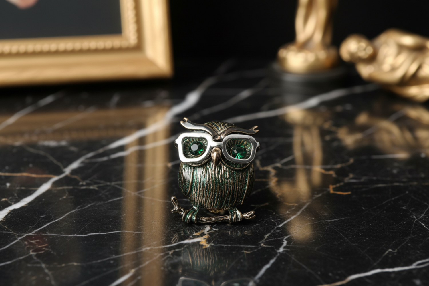 A Green Speckled Owl Shaped Lapel Pin