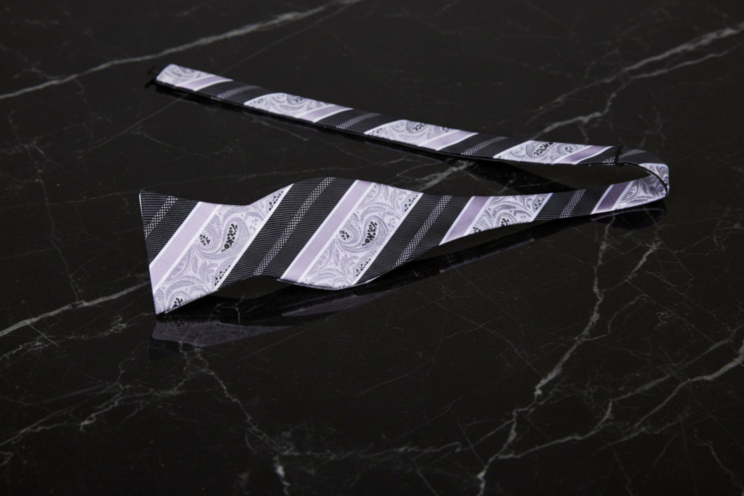 A Light Grey, Grey Stripe and Paisley Pattern Self Tie Bow Tie Untied