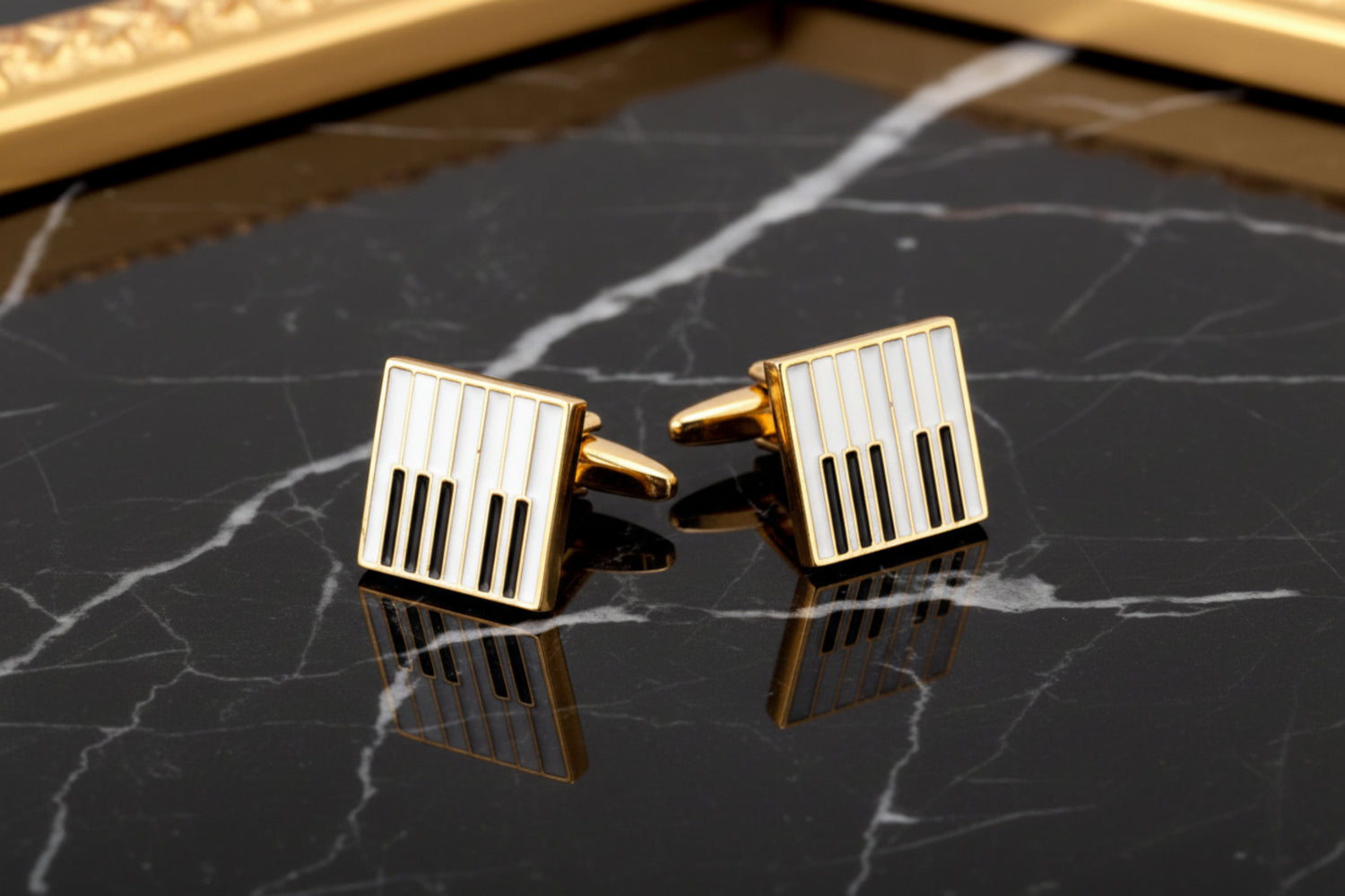A Gold, Black, White Color Keyboard Shape Cuff-links Set