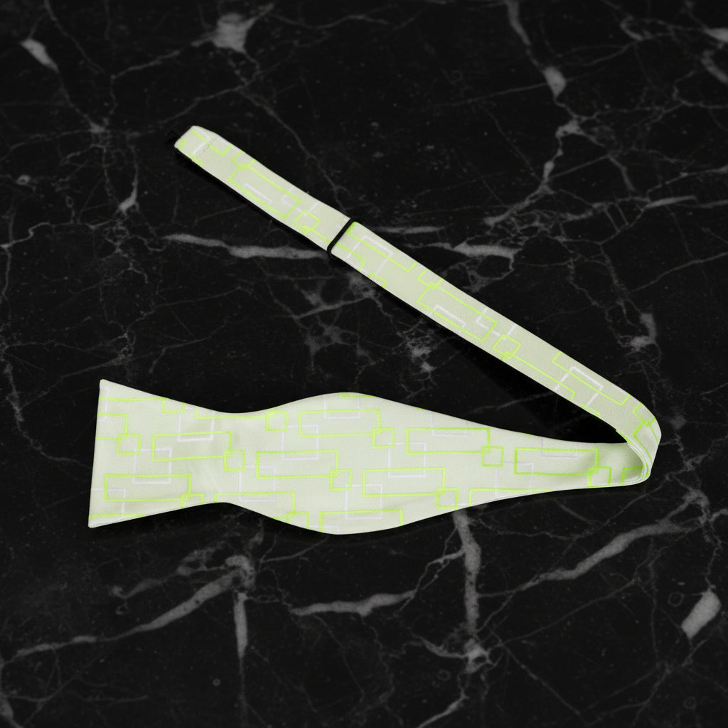 A Light Green Geometric Shapes Pattern Self Tie Bow Tie Untied