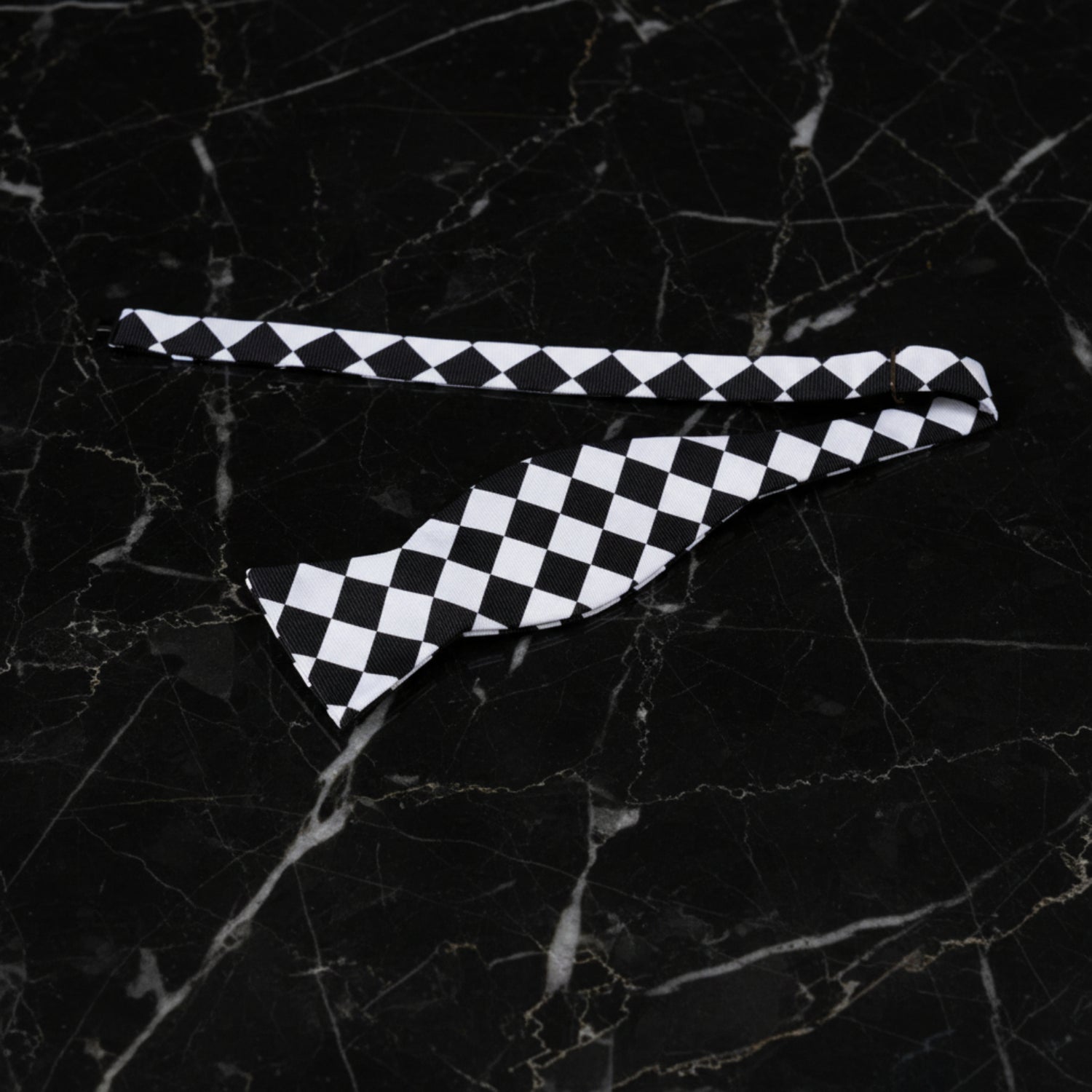 Single Self Tie Bow Tie: A Light Grey and Black Checkerboard Pattern Self Tie Bow Tie