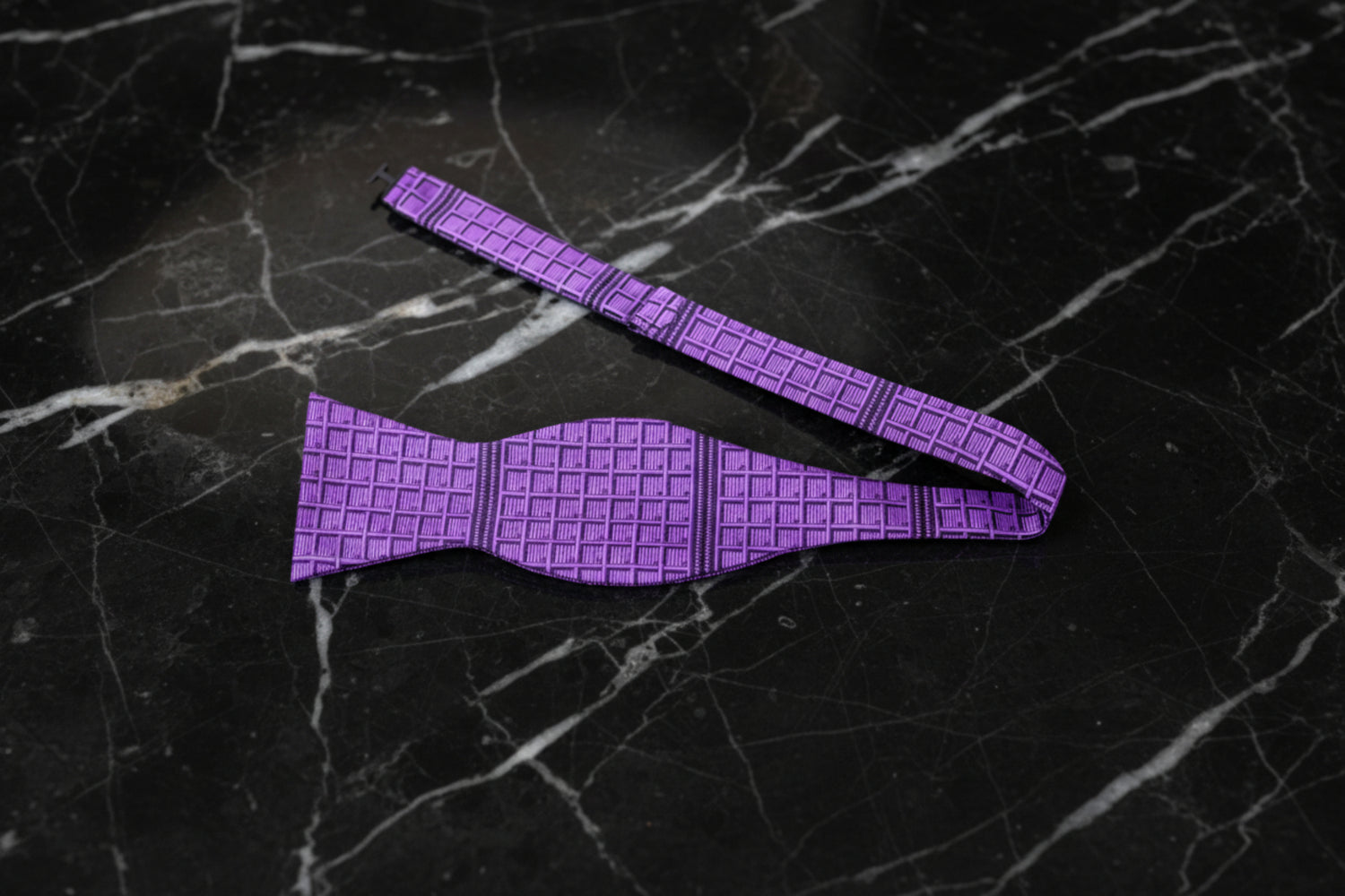 A Purple, Black Geometric Squares Pattern Self-Tie Bow Tie Untied