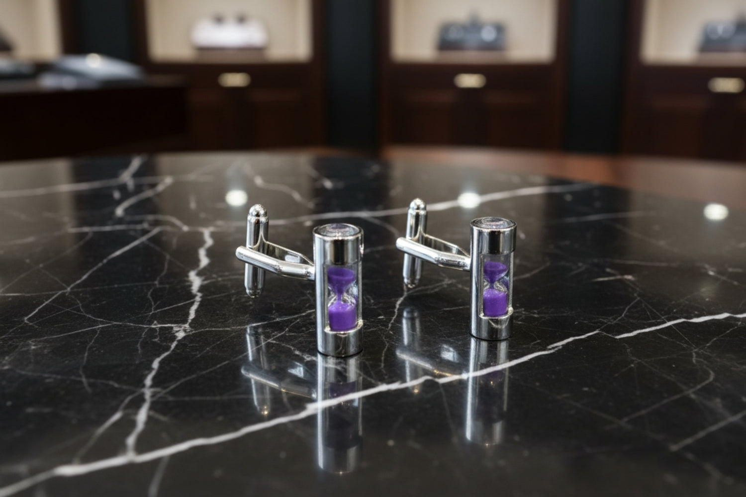 A chrome and purple colored hour glass shape cuff-links set||Purple Sand