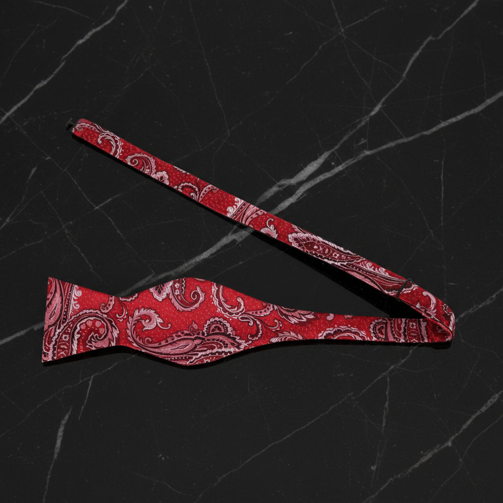 A Red, Blue Paisley Pattern Self Tie Bow Tie Untied
