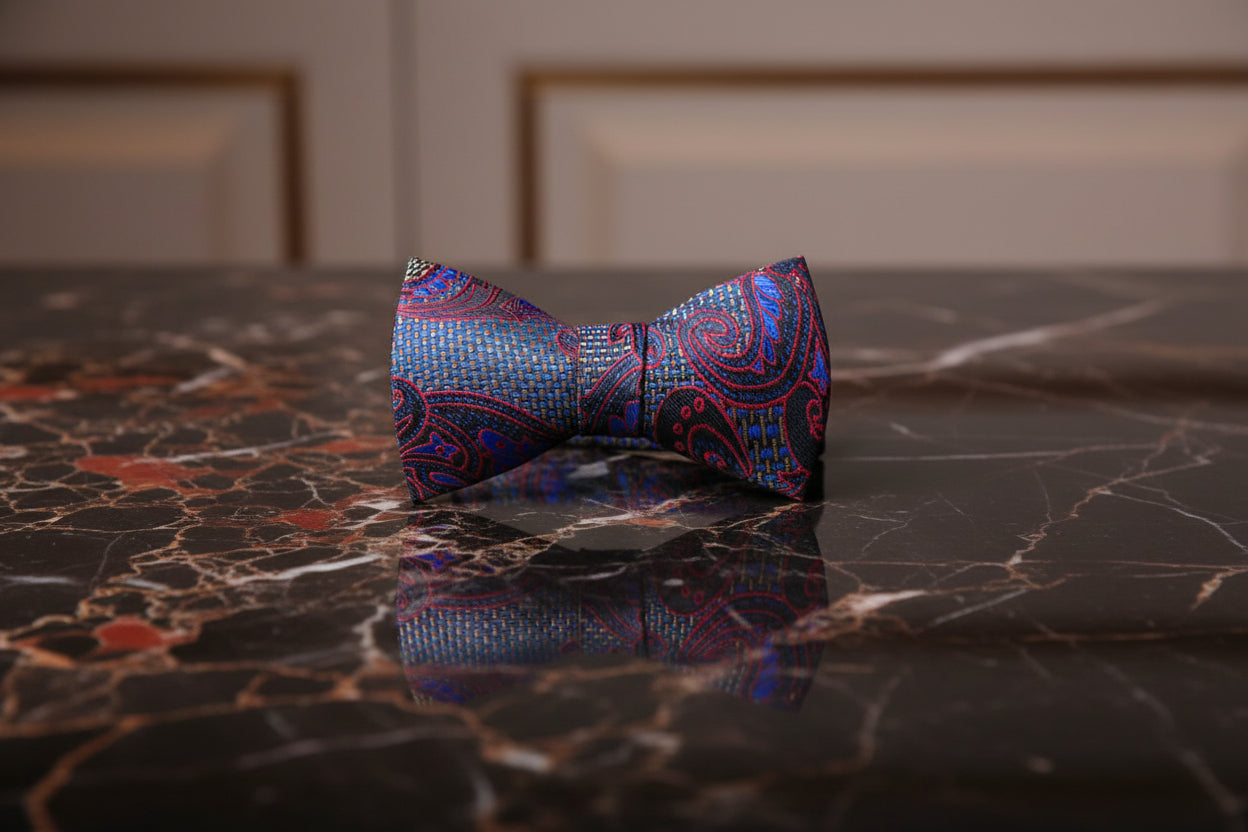 A Red, Blue, Grey Paisley Pattern Self Tie Bow Tie