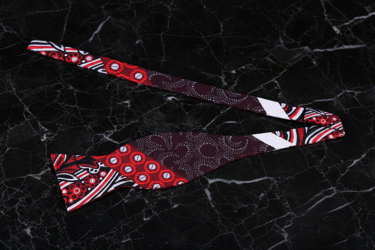 A Red, Brown, White Abstract Waves, Paisley, Dot Pattern Self Tie Bow Tie Untied View