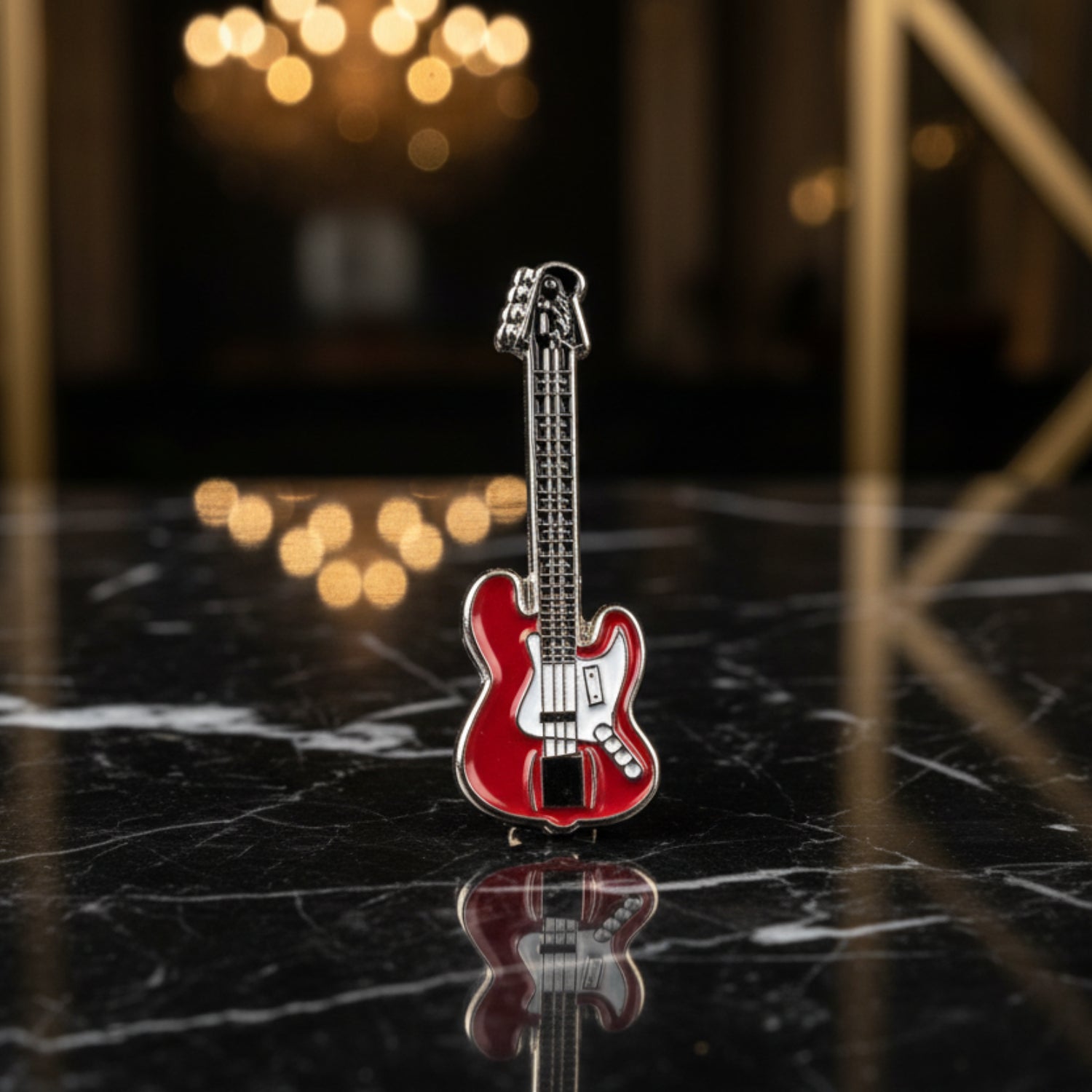Main View: A Red and Chrome Guitar Lapel Pin