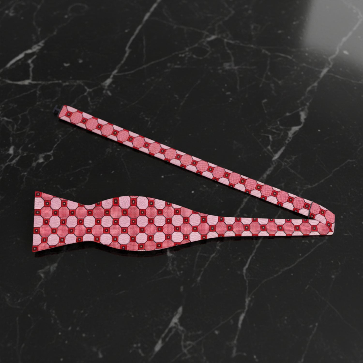 A Red, Pink Geometric Pattern Self Tie Bow Tie Untied