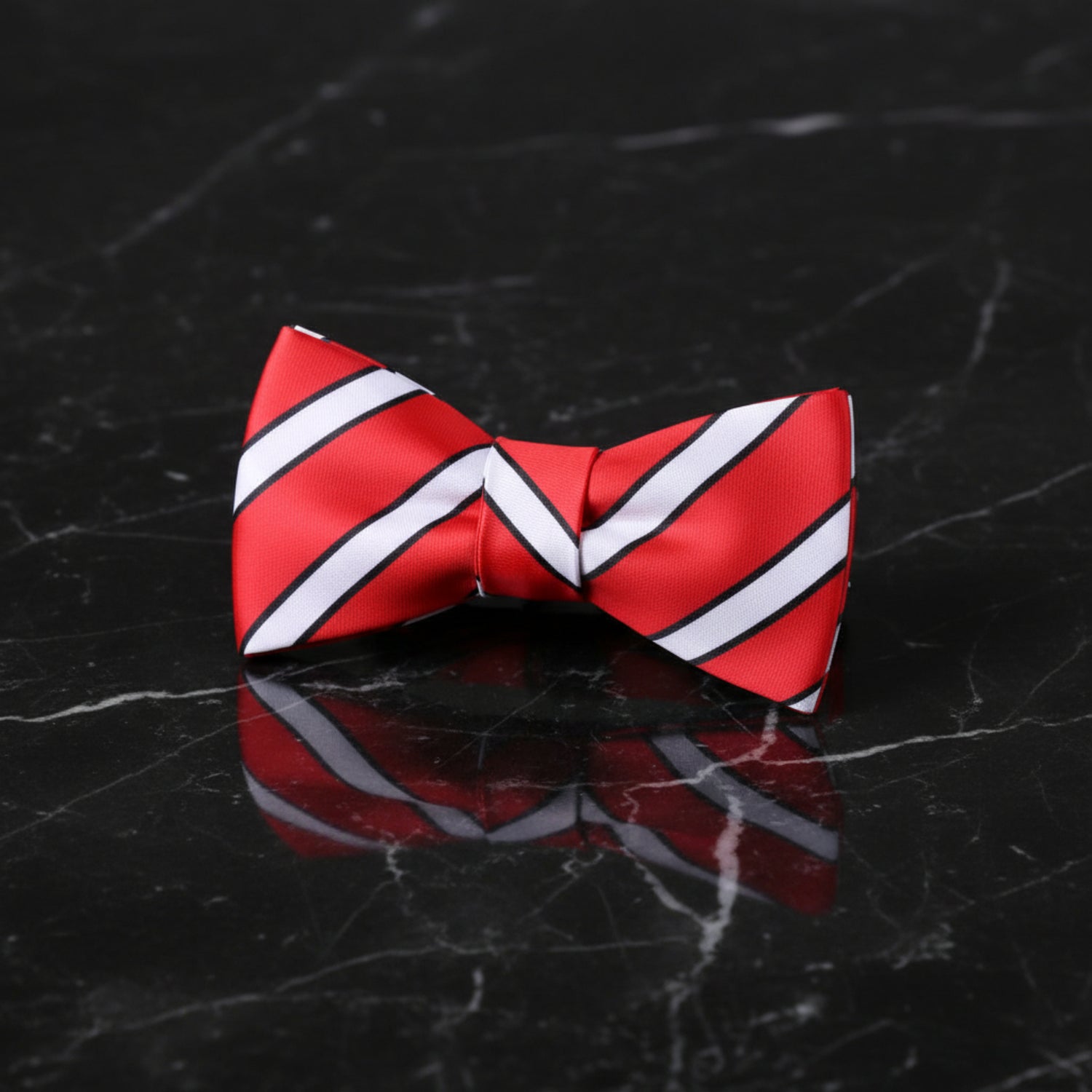 A Red, White, Black Stripe Pattern Self Tie Bow Tie 