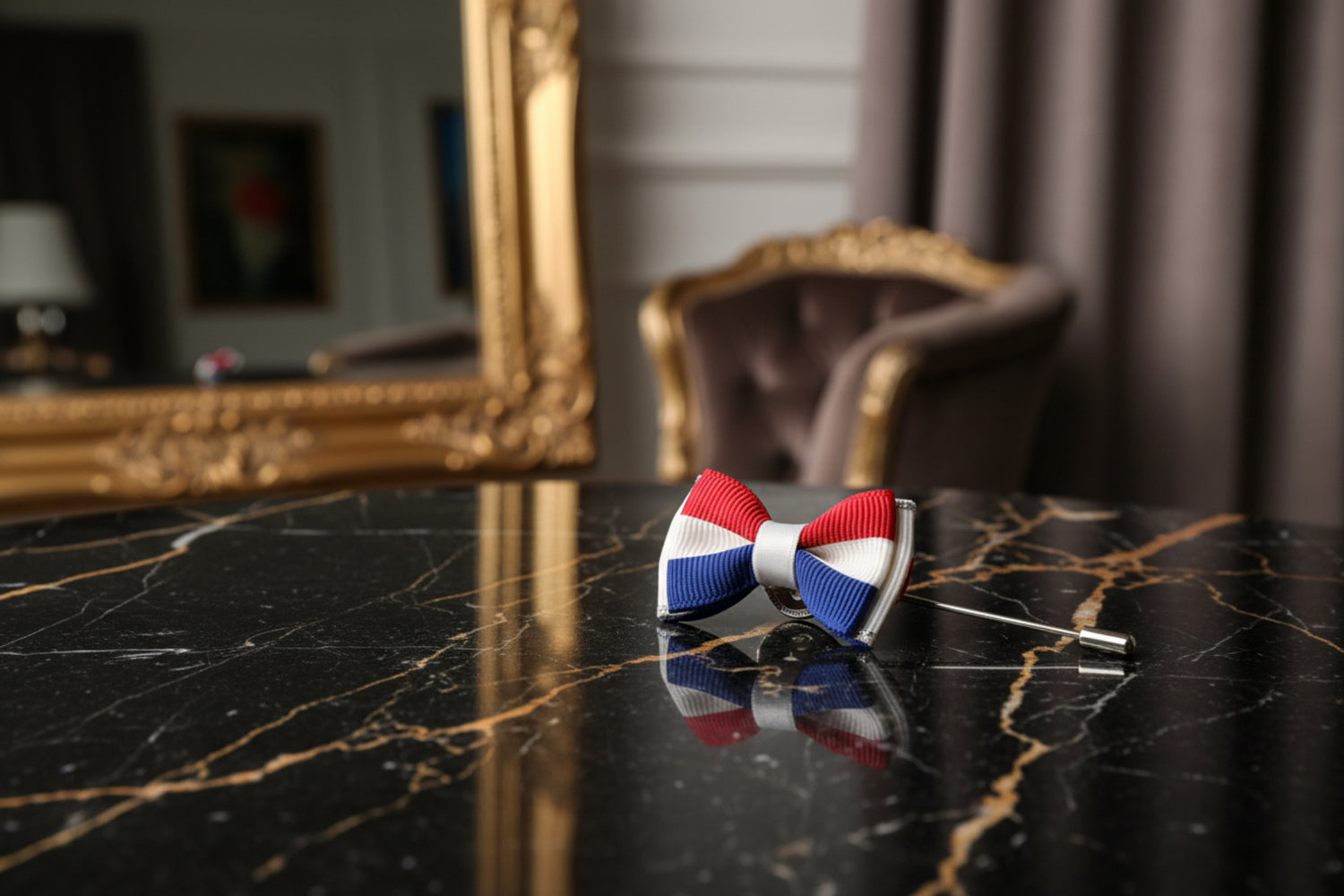 A Red, Blue, White Colored Bow Tie Shaped Lapel Pin||Red, White, Blue