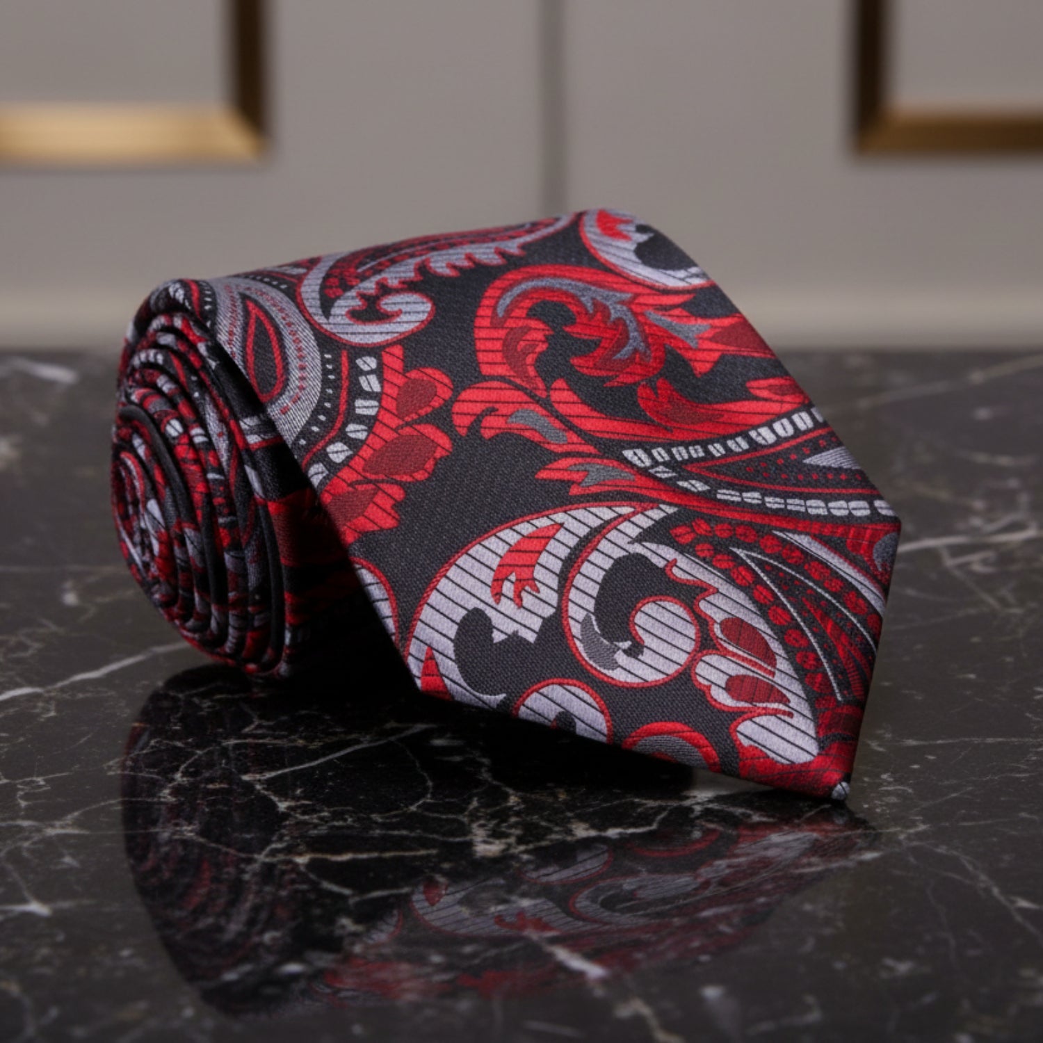 A Red, Dark Red, Silver Paisley Pattern Necktie 