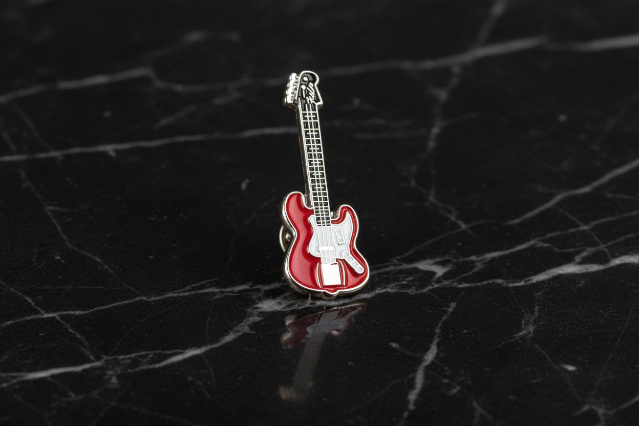 A Red and Chrome Guitar Lapel Pin