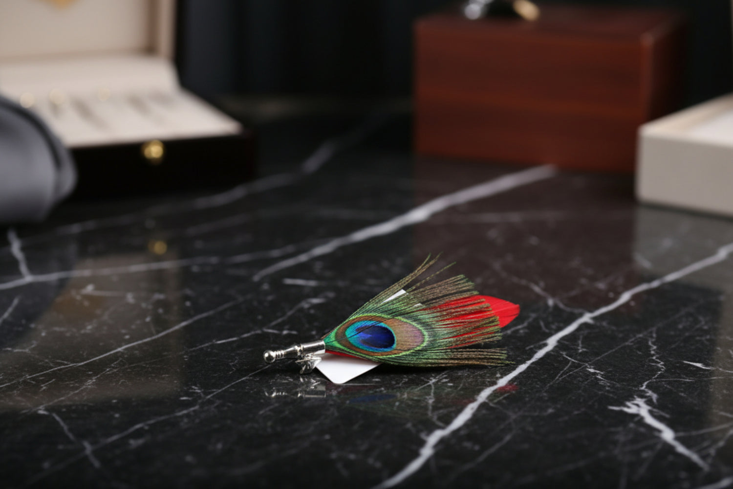 A Blue, Green and Red Peacock Feather Shaped Lapel Pin