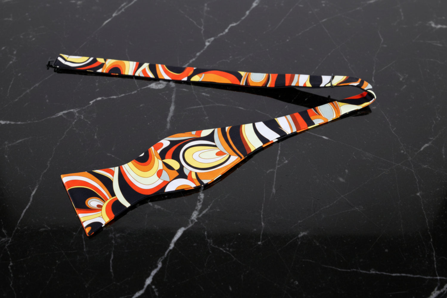 A Black, Yellow, Orange Abstract Pattern Self Tie Bow Tie Untied