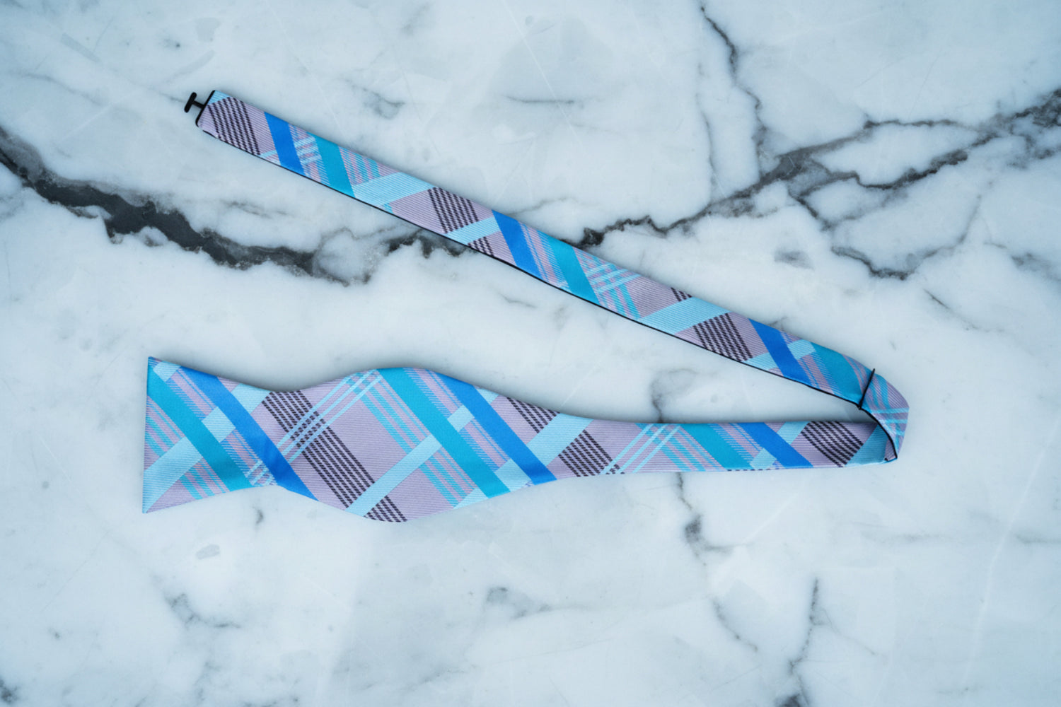 A Grey, Light Blue, Ice Blue Plaid Pattern Self Tie Bow Tie Untied