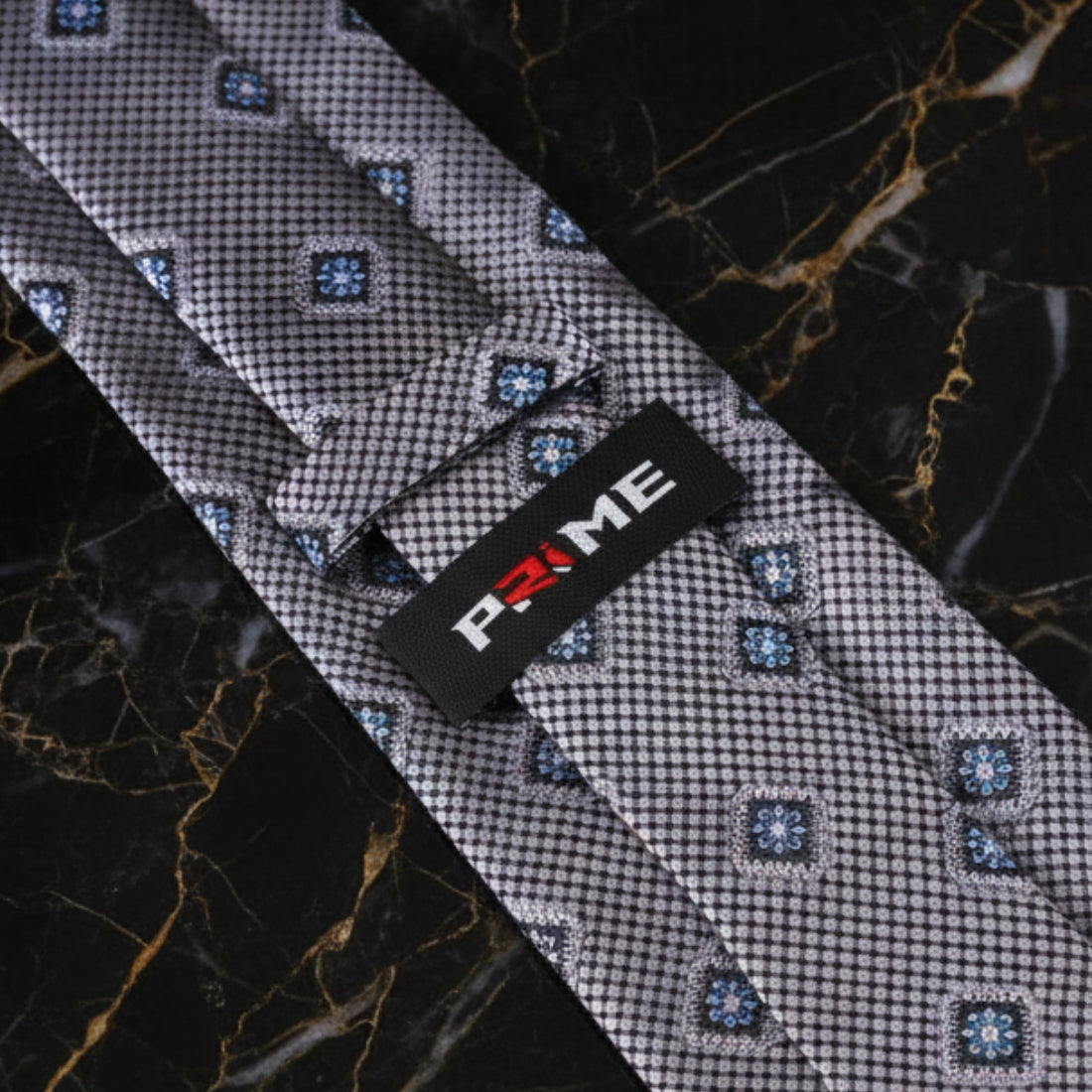 Grey Geometric Zodiac Medallion Tie Keep
