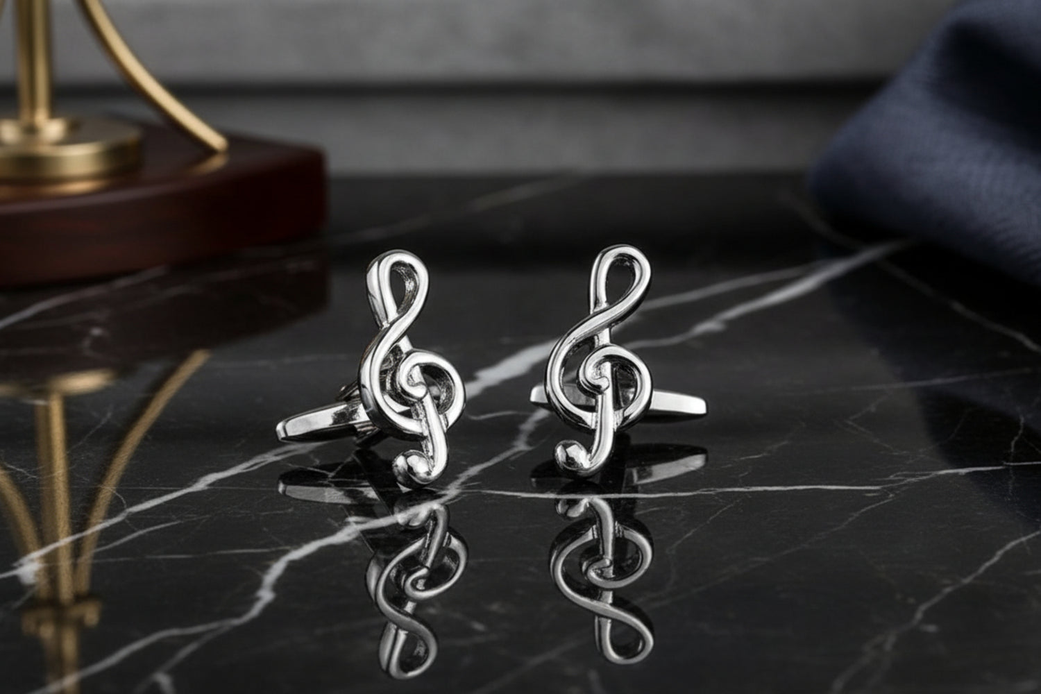 A Silver Music Note Cuff-link shape