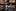 A White, Black, Chrome Colored Guitar Shape Pair of Cuff-links.