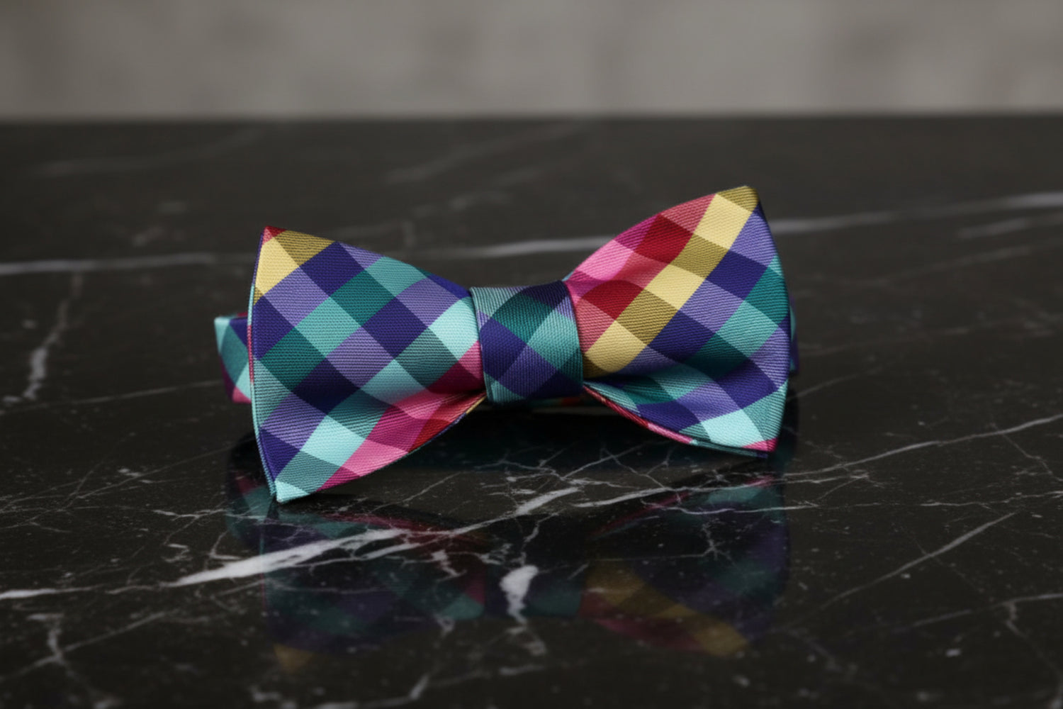 A Red, Blue, Yellow, Green Geometric Diamond Pattern Pre Tied Bow Tie