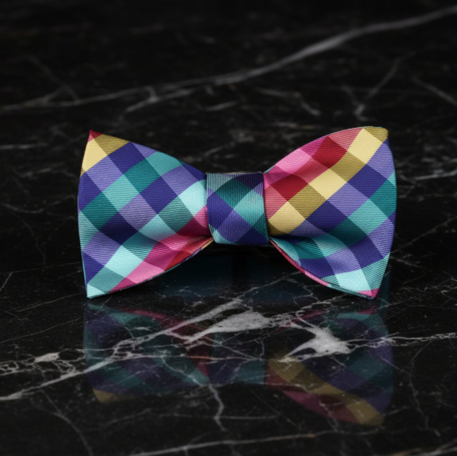 A Red, Blue, Yellow, Green Geometric Diamond Pattern Self Tie Bow Tie