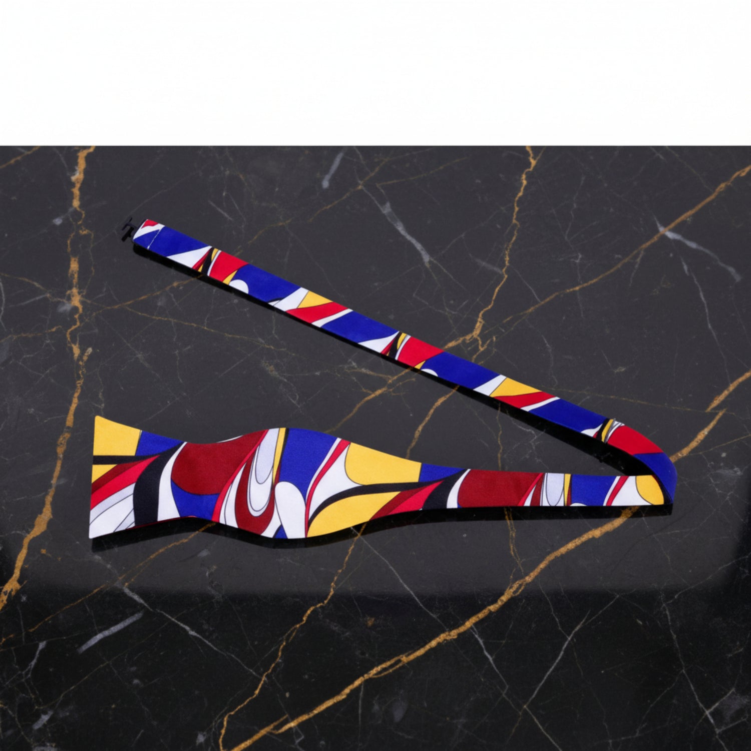 White, Blue, Red, Black, Yellow Abstract Bow Tie Untied