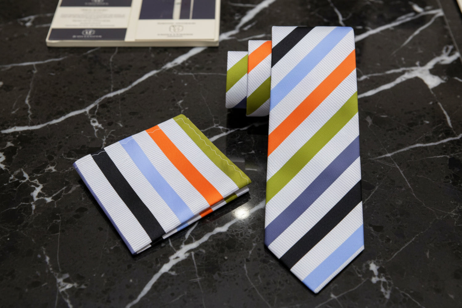 Alt View: A White, Olive, Orange, Black, Light Blue, Grey Stripe Silk Necktie, Matching Pocket Square