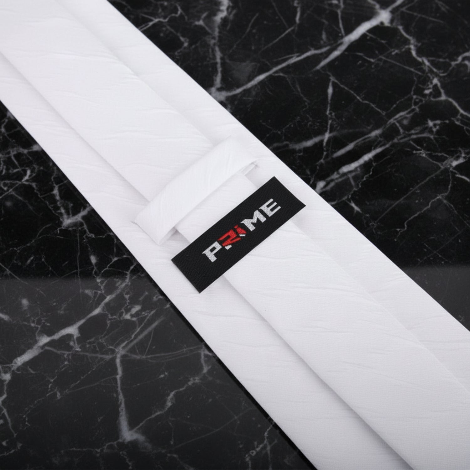 White Texture Tie Showing Logo