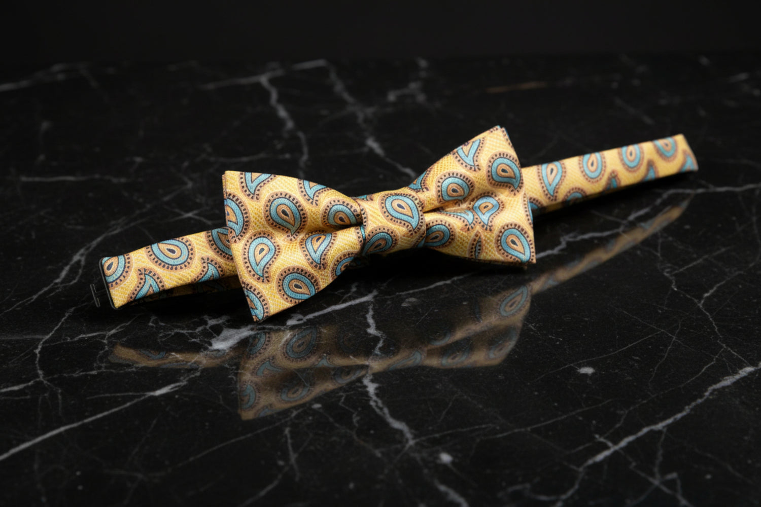 A Light Yellow, Light Blue Paisley Pattern Silk Self Tie Bow Tie Untied