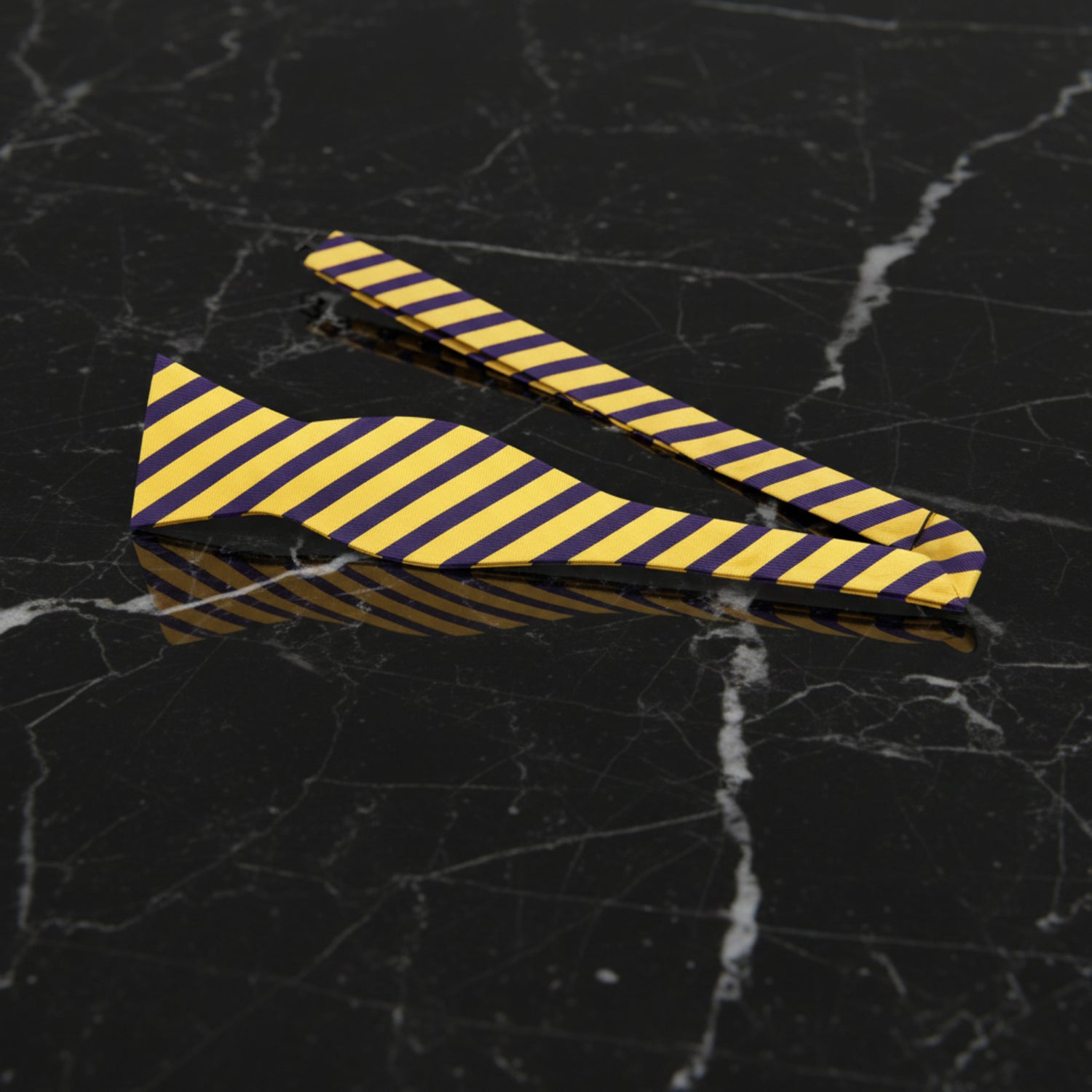 Untied: A Yellow And Dark Blue Striped Pattern Self Tie Bow Tie