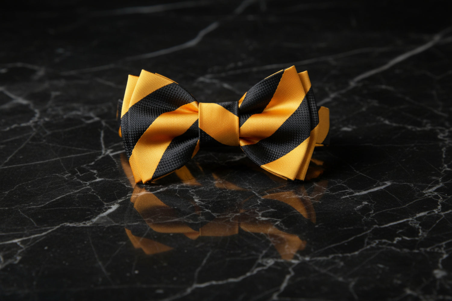 A Gold, Black Stripe Pattern Self Tie Bow Tie 