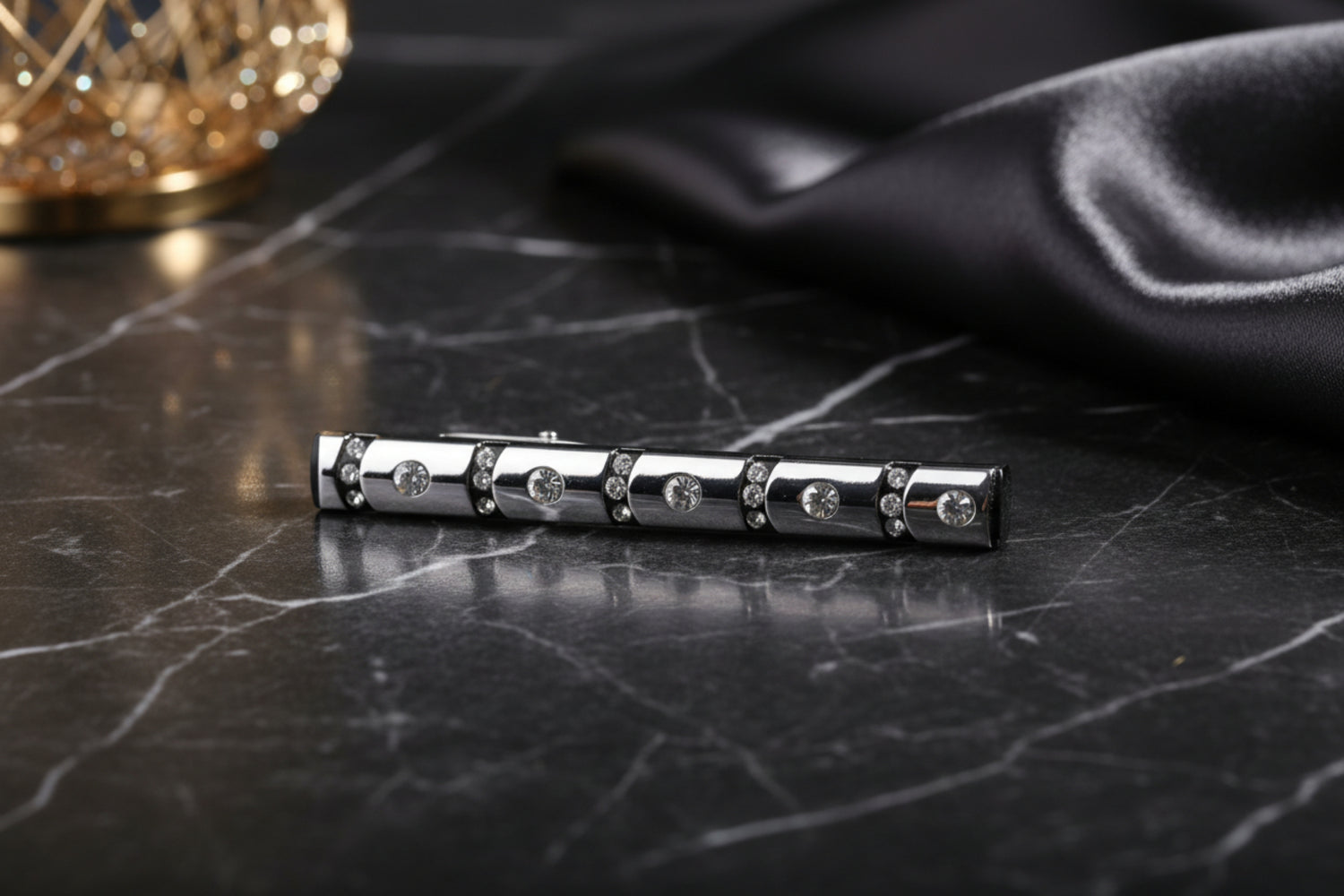 A Chrome, Black, Clear Stone Sphere Shape Tie Bar