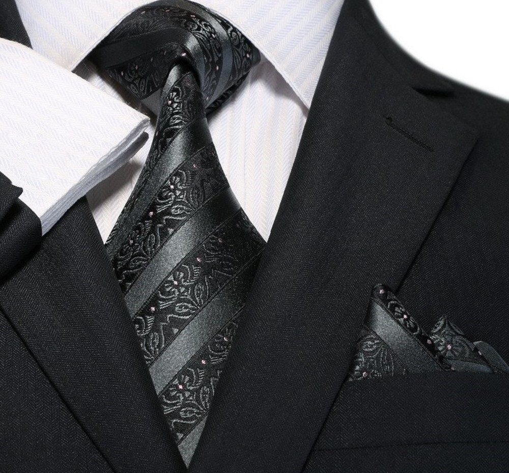 A Black Floral And Stripe Pattern Necktie, Matching Pocket Square