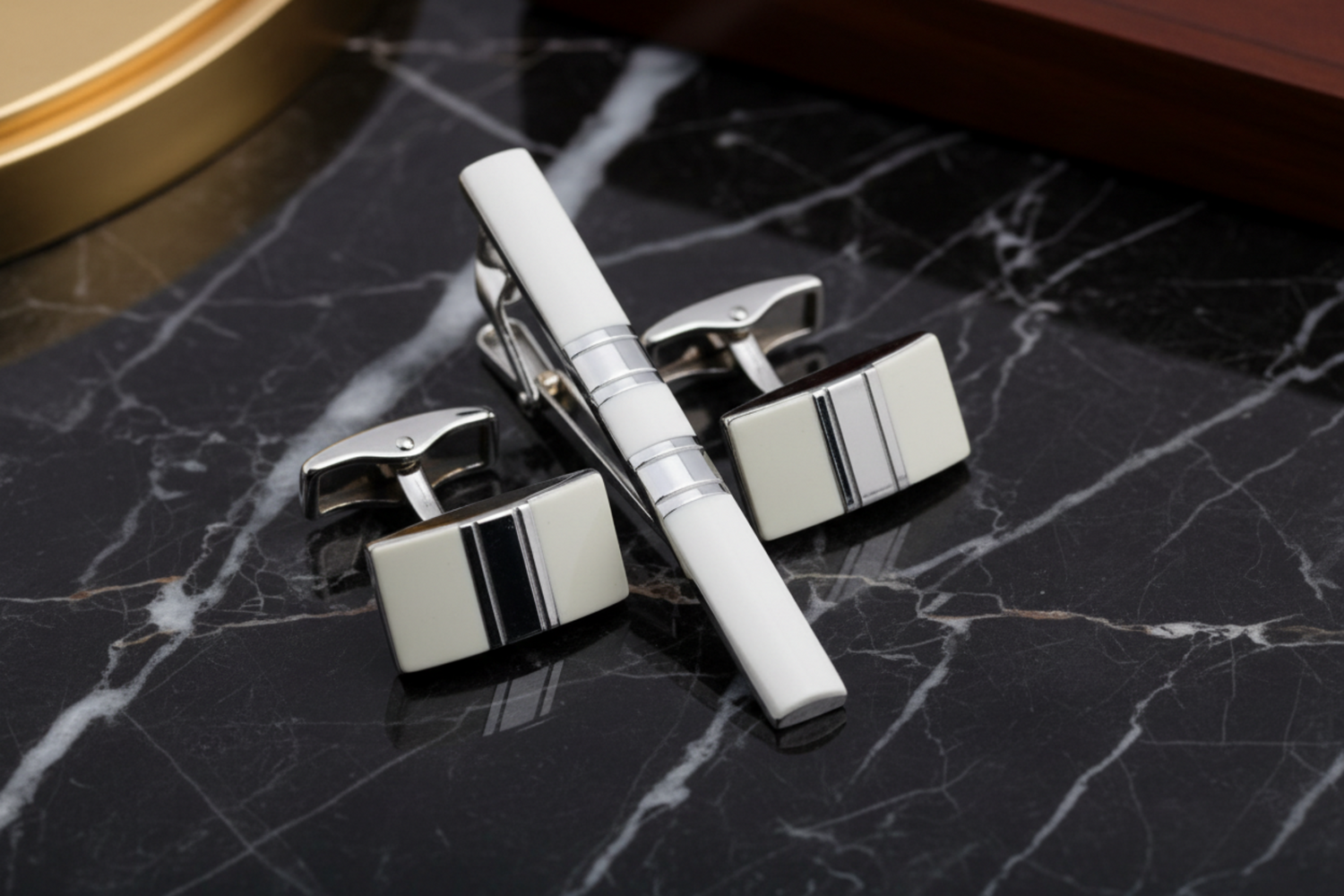 A Chrome and Pearl Color With Bar Shapes Tie Bar and Cuff-links Set