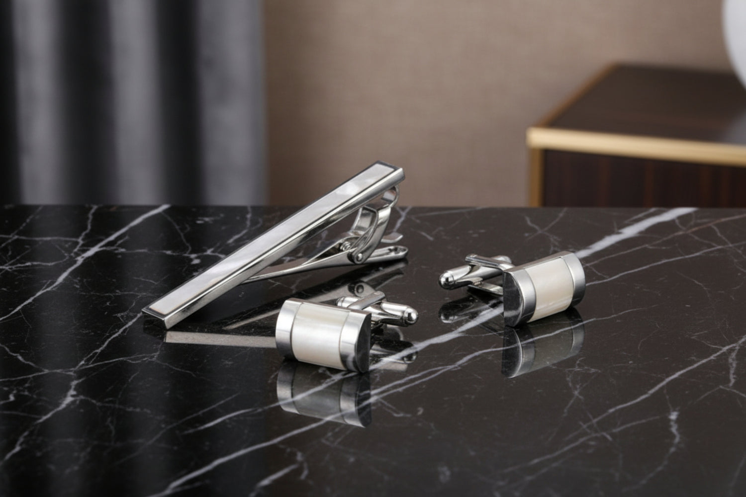 View 2 A Chrome and Pearl Colored Sphere Shaped Tie Bar and Cuff-links Set
