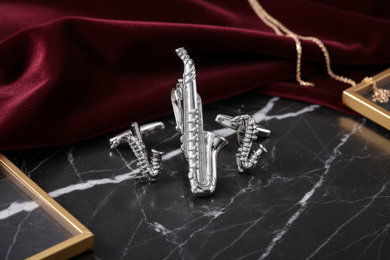 A Chrome Colored Saxophone Shaped Tie Bar and Cuff-links Set