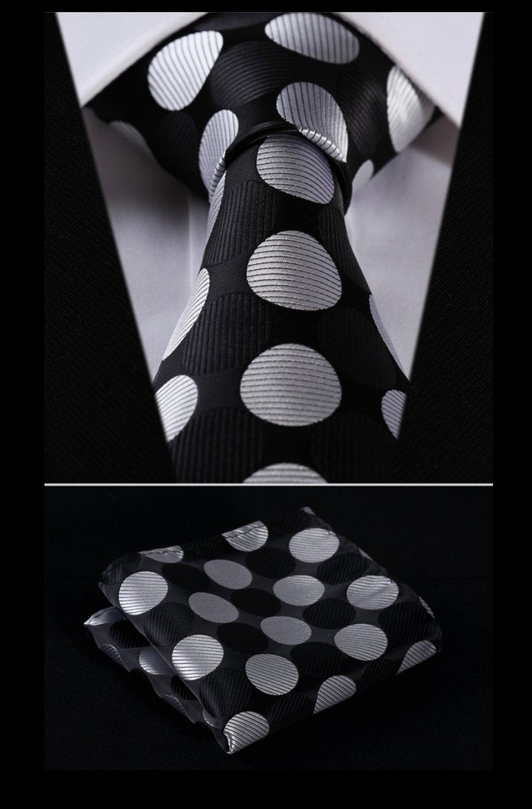 A Black, Grey Large Polka Dot Pattern Necktie With Matching Pocket Square 